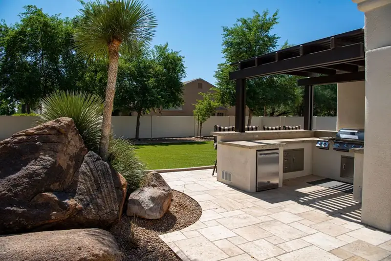 Backyard patio with landscaping